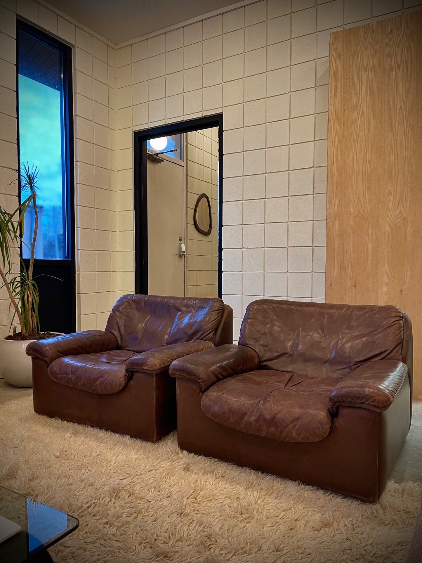 vintage De Sede brown leather chairs